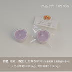 Round tealight candle, dark purple (scent: juniper lavender)