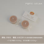 Round tea light candle, dark brown color (scent: velvet linen)
