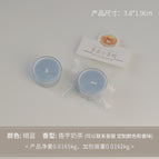 Round tea light candle, dark blue (scent: taro milk tea)