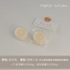 Round tea light candle, milky white (scent: Berlin Girl)